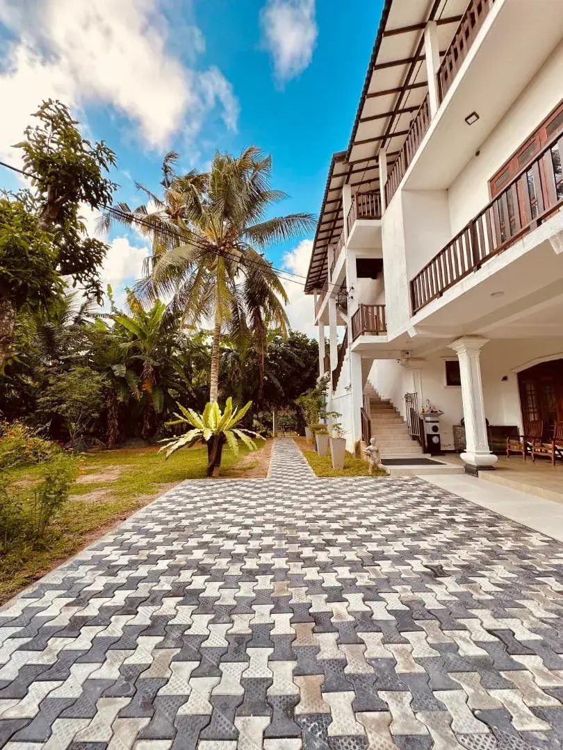 Villa exterior with palms